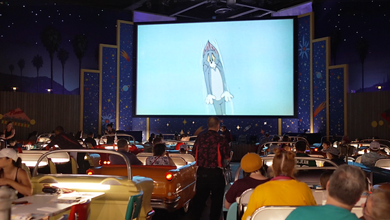 audience watching science fiction movie in theater